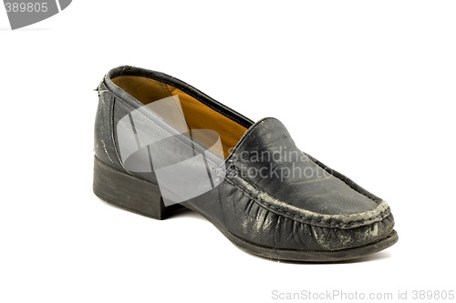 Image of Old grungy womens shoe isolated on white background