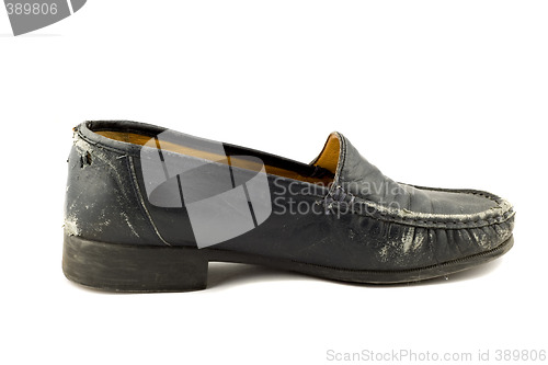 Image of Old grungy womens shoe isolated on white background