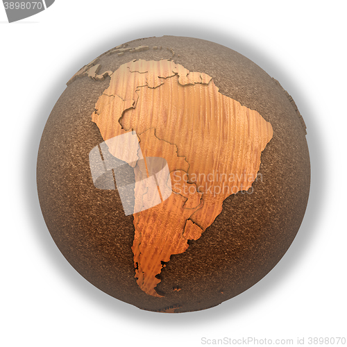 Image of South America on wooden planet Earth