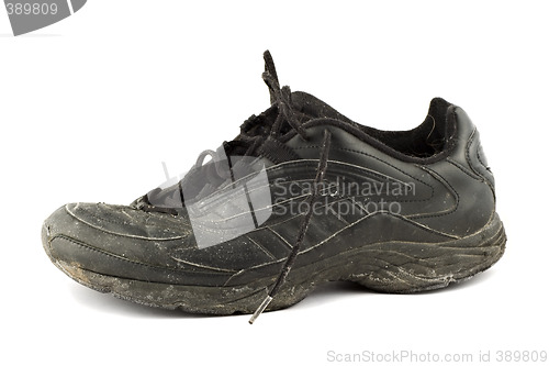 Image of Old grungy Running Shoes isolated on white background