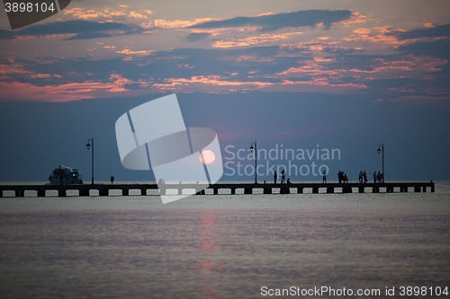 Image of Beautiful sunset under pier