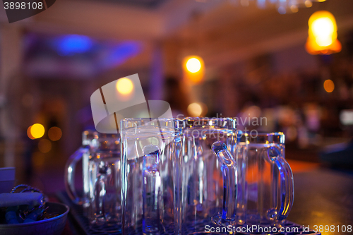 Image of Clean glassware on the counter of a nightclub