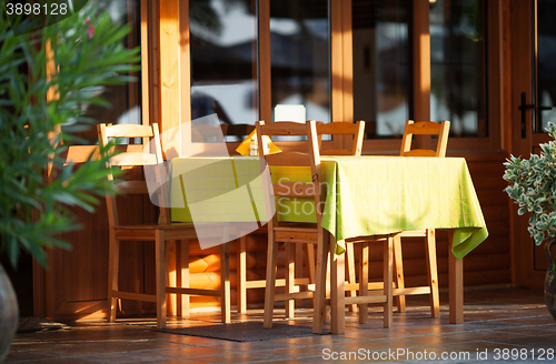 Image of Colorful outdoor table at an open-air restaurant