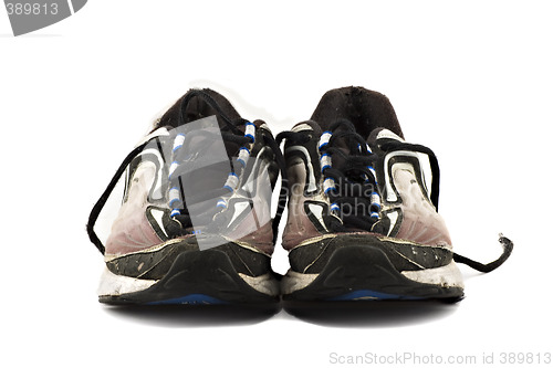Image of Old grungy Running Shoes isolated on white background