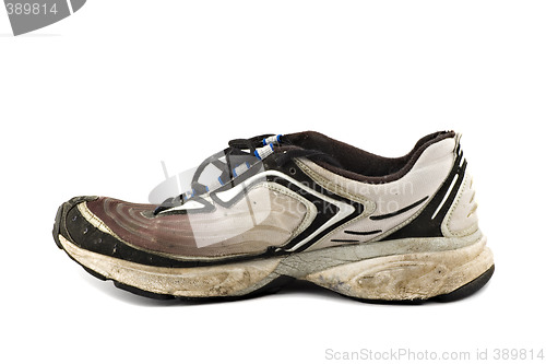 Image of Old grungy Running Shoes isolated on white background