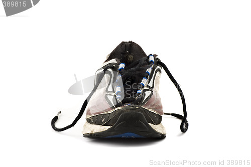 Image of Old grungy Running Shoes isolated on white background