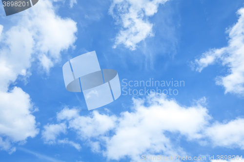 Image of bright blue sky with some clouds