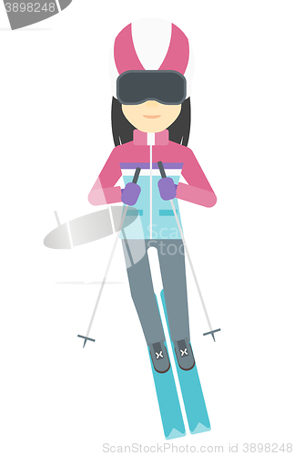 Image of Young woman skiing.