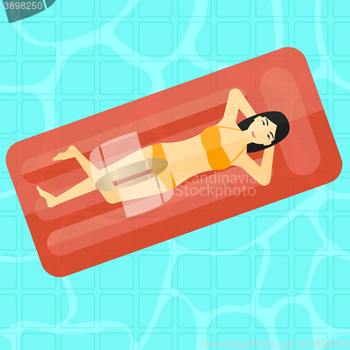 Image of Woman relaxing in swimming pool.
