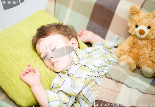 Image of Cute little boy is sleeping