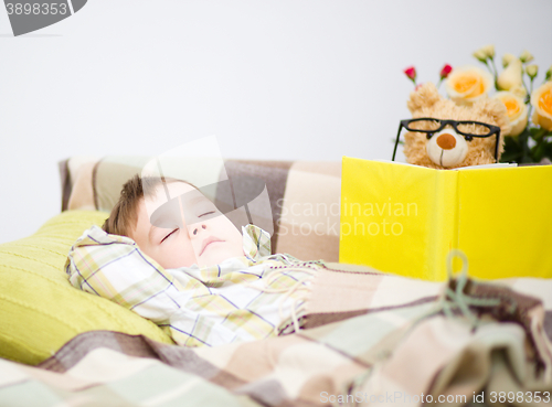 Image of Cute little boy is sleeping