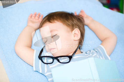 Image of Cute little boy is sleeping