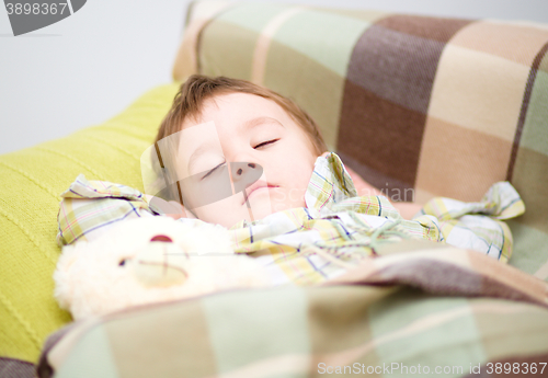 Image of Cute little boy is sleeping