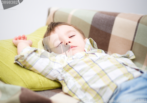 Image of Little boy is sleeping