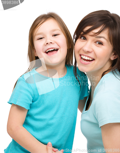 Image of Portrait of a happy mother with her daughter