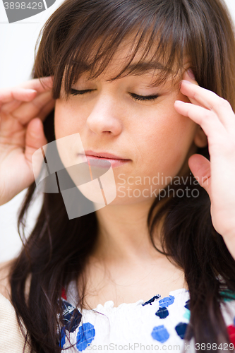 Image of Woman is suffering headache