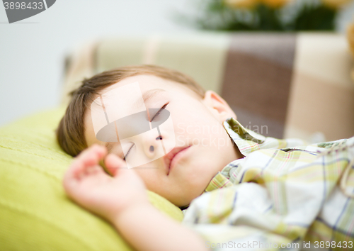 Image of Cute little boy is sleeping