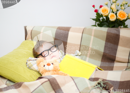 Image of Cute little boy is sleeping