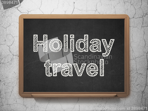 Image of Travel concept: Holiday Travel on chalkboard background