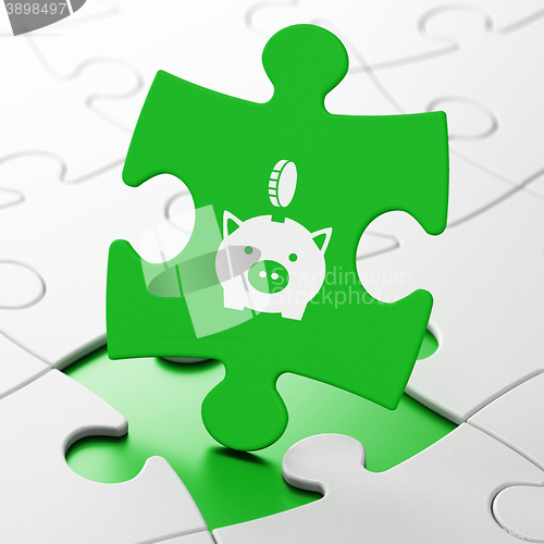 Image of Banking concept: Money Box With Coin on puzzle background