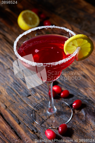 Image of Cosmopolitan cocktail top on bar