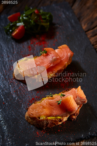 Image of bruschetta sandwich with salmon