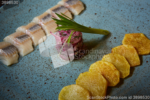 Image of herring with potatoes