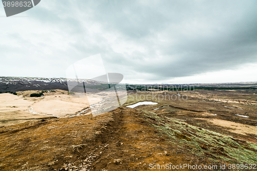 Image of Iceland landscape with mountains in the horizont