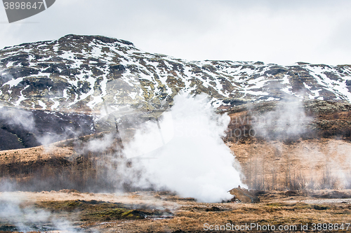 Image of Geothermal nature with steamy fields