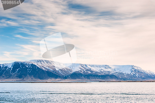 Image of Mountain with snow in the ocean