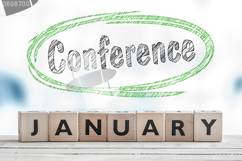 Image of January conference sign on a table