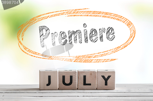 Image of July premiere message on a stage