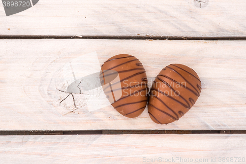 Image of Chocolate eggs on a wooden table