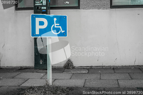 Image of Handicap parking sign on a street