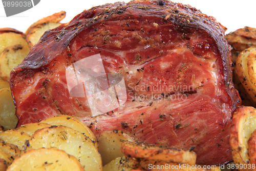 Image of smoked and grilled meat with potatoes slice