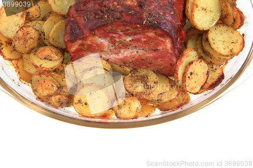 Image of smoked and grilled meat with potatoes slice