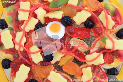 Image of color jelly candies as pizza 