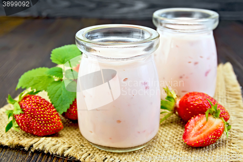 Image of Yogurt with strawberries on sacking