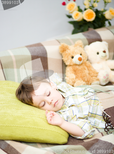 Image of Cute little boy is sleeping