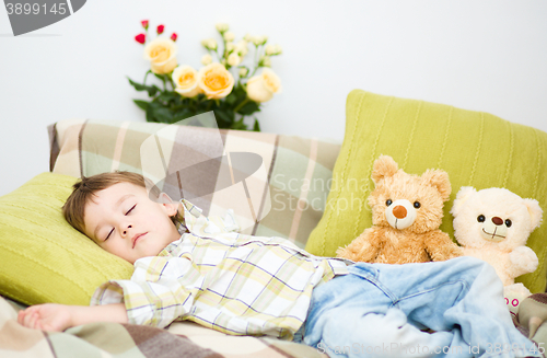 Image of Cute little boy is sleeping