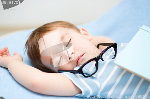 Image of Cute little boy is sleeping