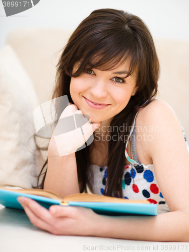 Image of Woman is reading a book