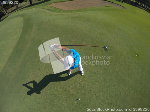 Image of top view of golf player hitting shot