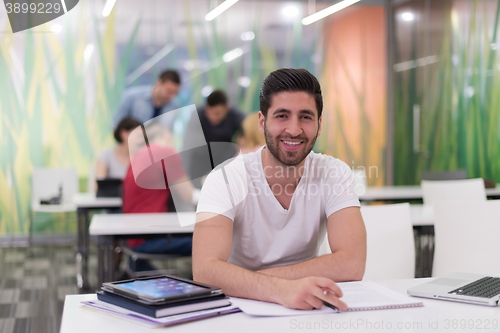 Image of male student in classroom