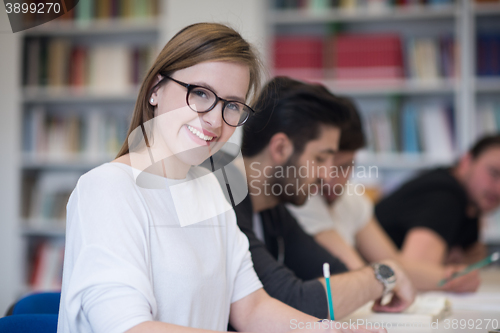 Image of group of students study together in classroom
