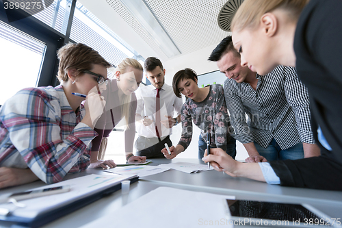 Image of top  view of business people group brainstorming on meeting