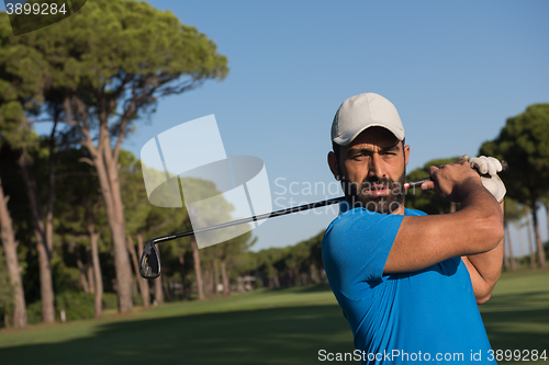 Image of golf player hitting shot