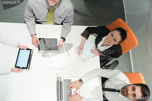 Image of aerial view of business people group brainstorming on meeting