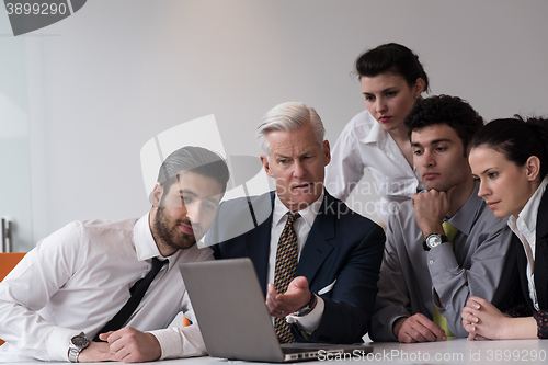 Image of business people group on meeting at modern startup office