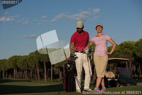 Image of portrait of couple on golf course